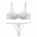 Detailed view of the white lace embroidery bra set with mesh and adjustable straps - S / White + Thong