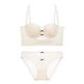 French lace lingerie set in creamy white with floral embroidery and small black bows - 70B / Off-white