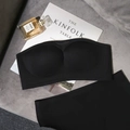 Seamless strapless black lingerie set with bandeau bra and matching briefs on grey fabric - Black Zirconia Set