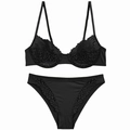 Completo intimo in pizzo nero con reggiseno con ferretto e motivo floreale raffinato - S / Nero