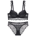 Completo intimo in pizzo nero con reggiseno push-up e slip coordinati in rete mesh - 70A / Nero