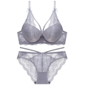 Detail of lavender lace lingerie set showing embroidery and bow accents on 3/4 cup bra - 70A / Grey Set