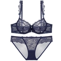Completo intimo in pizzo blu scuro con rete trasparente e dettagli di fiocchetti - 70A / Blu