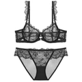 Elegante set di lingerie in pizzo nero con motivi floreali e fiocchi delicati - Nero / 70B