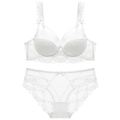 Elegant white lace lingerie set with 3/4 cup push-up bra and matching panties - 70A / White