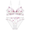 Detail view of white mesh lingerie set with purple floral embroidery and lace texture - 70B / White