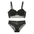 Detail of black lace bra set featuring steel underwire and gold ring hardware accents - Black / 70B