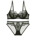 Detailed close-up of olive green lace lingerie set with sheer mesh and floral embroidery - 70A / Green