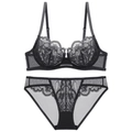 Detailed close-up of a black lace lingerie set with floral embroidery and mesh texture - 70A / Black