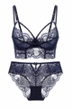 Detail of navy blue longline lace bra with floral patterns and cross-strap accents - Blue