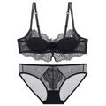 Completo intimo sexy in pizzo nero con reggiseno e slip trasparenti coordinati - Nero / 70B