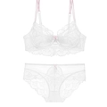 Detailed view of white floral lace lingerie set with light pink straps and bow - 70A / Top And Bottom / White