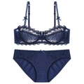 Elegant navy blue lace lingerie set with floral embroidery and bow details on white background - 70A / Top And Bottom / Blue