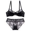 Sexy black lace lingerie set with floral patterns and adjustable straps on white background - 70A / Top And Bottom / Black