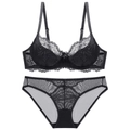 Elegant black lace lingerie set featuring a floral bra and matching mesh panties on white back - 70A / Top And Bottom / Black