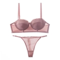 Pink lace lingerie set featuring a half-cup push-up bra and matching thong underwear - Pink