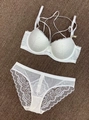 White lace lingerie set with push-up bra and strappy back details in elegant floral embroidery - 70A / Top And Bottom / White