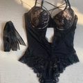 French lace bodysuit in black with sheer mesh panels and bow accents for women - 70B / Black