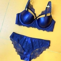 Flat lay of dark blue lace satin lingerie set with push-up bra and eyelash lace detail - 85B / Tops / Blue