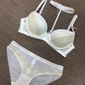 Completo intimo in pizzo bianco con reggiseno push-up e laccio al collo taglia 75B - 70B / Bianco