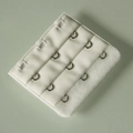 Standard 3-row 3-hook white bra extender made of soft fabric and durable stainless steel - One Size / White
