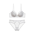 Dettaglio del set lingerie in mesh bianco con strisce verticali e design con spalline - 70A / Bianco