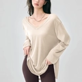 Dettaglio del copricostume da yoga beige traspirante con trama a coste e scollo a V - Taglia unica / Albicocca Ottica