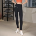 High-waisted black yoga leggings with grey patchwork waist detail and slim fit design - S / Black