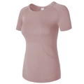 Détail du haut de yoga sans couture rose avec maille alvéolée et texture ergonomique - Rose foncé
