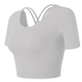 Detailed back view of white yoga top with criss-cross straps and wide elastic hem - Off-White