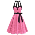 Detail van de roze polkadot halterjurk met zwarte kraag en satijnen strik in de taille - S / Roze