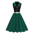 Detailed view of sleeveless polka dot dress with retro lapel and white waist belt - S / Green