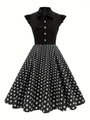 Detail of vintage 1950s dress featuring a bow neckline and polka dot high waist skirt - S / Black