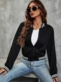 Close-up of black quilted jacket with textured diamond pattern and striped ribbed cuffs - S / Black
