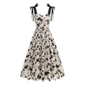 Detail of elegant floral print A-line dress with black shoulder bows and heart neckline - S / Black