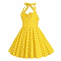 Detailed close-up of yellow polka dot halter dress with a decorative front bow - XS / Yellow