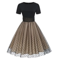 Detailed view of the layered tulle skirt with polka dot pattern on vintage Hepburn dress - Black