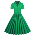 Detail of emerald green vintage dress featuring notch lapel, buttons and matching belt - Green