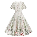 Close-up of floral embroidery detail on a white tulle vintage dress with green leaves - S / White