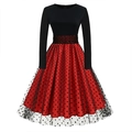 Detail of red skirt with black polka dot mesh overlay and spliced long sleeve bodice - S / Red