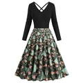 Detalle del vestido navideño vintage con escote en V y estampado festivo único - M / Verde