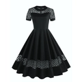 Detail view of 1950s vintage black A-line dress with circular hollow lace stitching - S / Black
