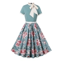 Detail of vintage dress featuring a large white bow collar and floral rose pattern skirt - S / Green