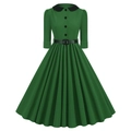 Detail of vintage green dress featuring a black Peter Pan collar and waist belt accents - S / Dark Green