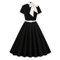 Detail of elegant black dress featuring a large white satin bow and slim waistline - S / Black
