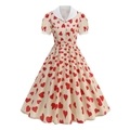 Detalle de vestido vintage con estampado de corazones, cuello Peter Pan y mangas abullonadas - S / Corazón Albaricoque