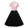 Pink and black Hepburn style dress with short sleeves and white bow tie detailing - S / Pink