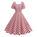 Detail of pink vintage square neck dress with black heart print and ruffle sleeves - S / Pink