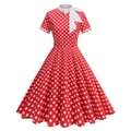 Detail eines 1950er Vintage-Kleides in Rot mit weißen Punkten und weißer Schleife - S / Rot
