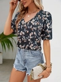 Detail of V-neck floral blouse with navy background and orange-white blossoms - XS / Dark Green